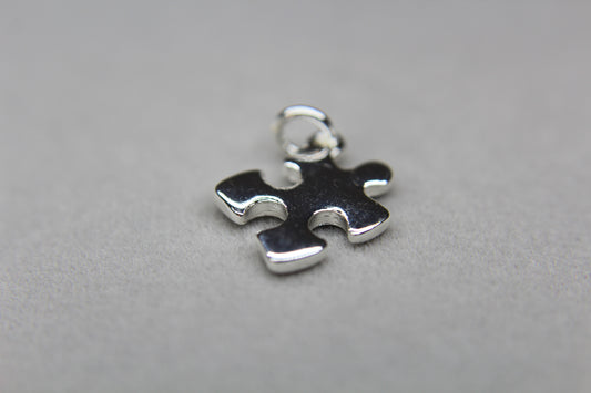 Silver plated Puzzle Piece Charm